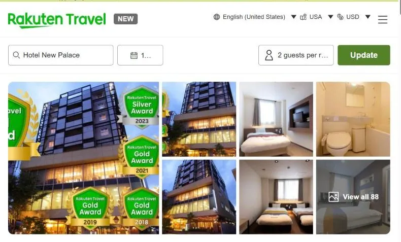 Rakuten Travel's page for Hotel New Palace, showing a glass-fronted city hotel lit at night and hung with Rakuten award badges from 2018 to 2023, with a compact single room and a unit bathroom.
